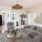 furnished living room next to kitchen